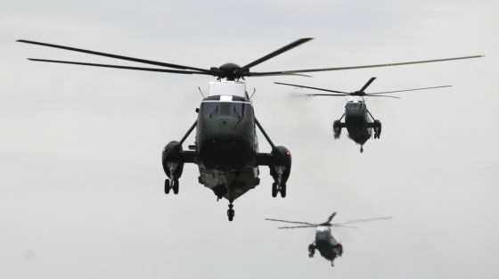 Image: The helicopter with U.S. President Barack Obama onboard and backup helicopters arrive on the South Lawn of the White House in Washington